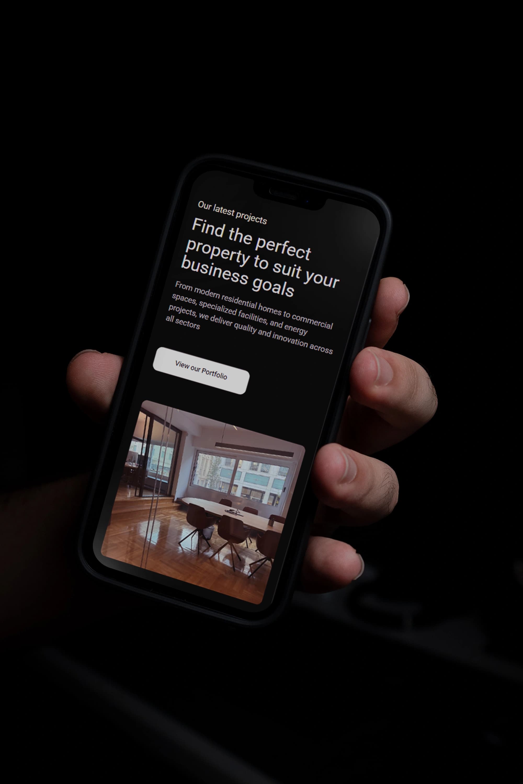 Hull Development website displayed on iPhone