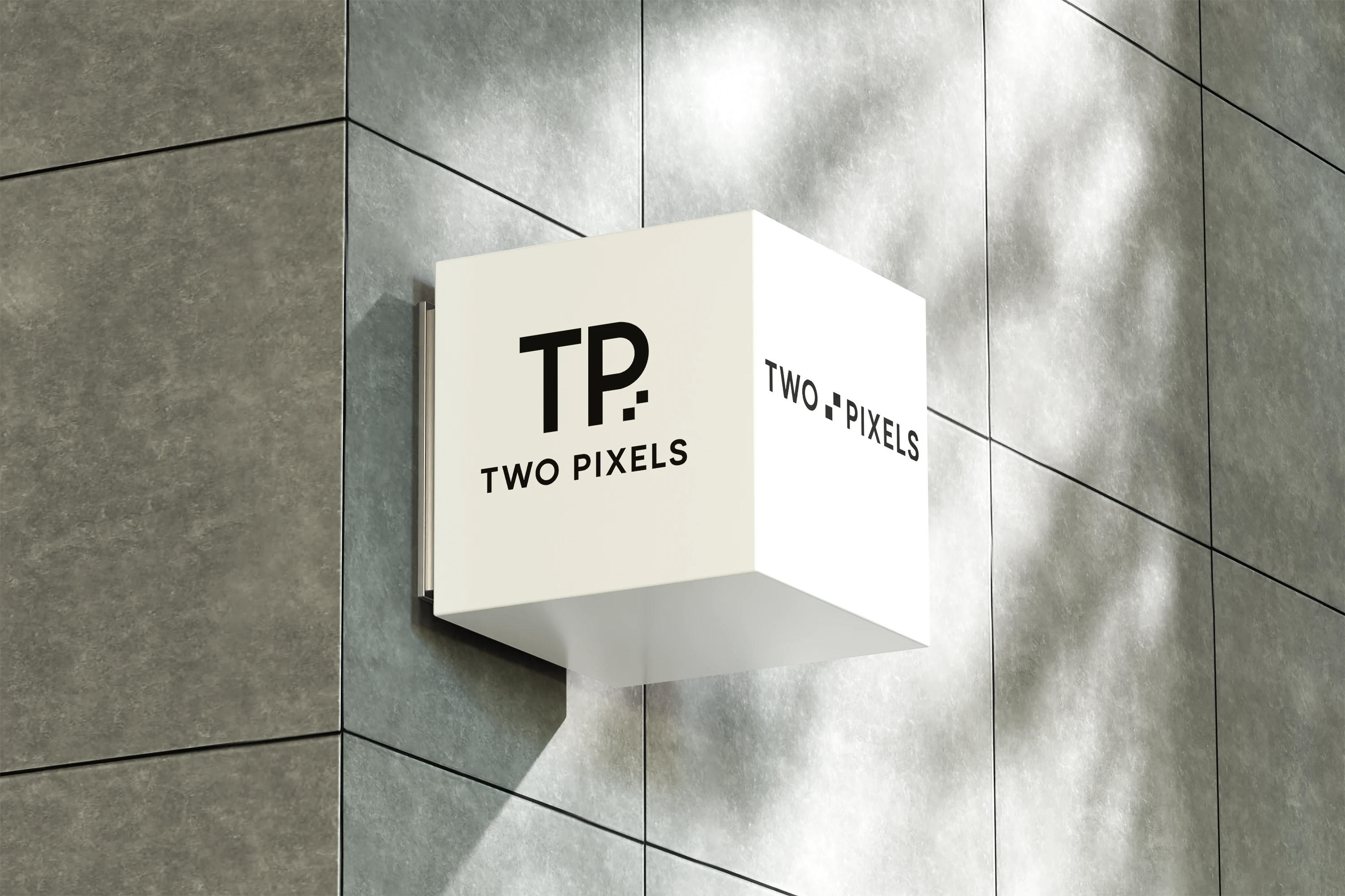 An image of square box haning off of the wall with the two pixels logo in the websites section
